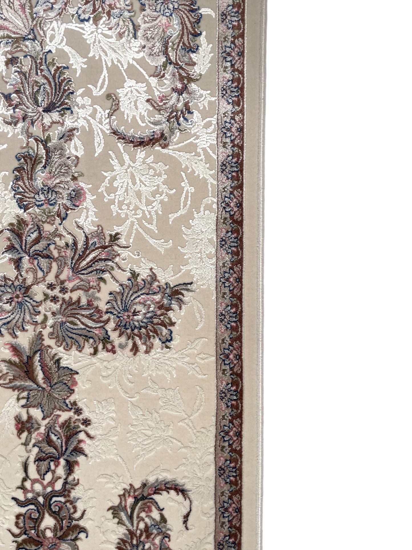 The Ishara rug displays the traditional Islamic "mihrab" design with a textured floral pattern.