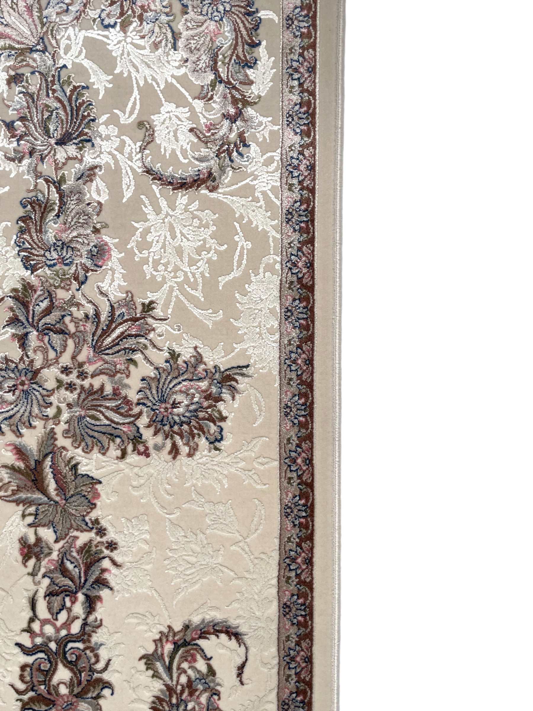 The Ishara rug displays the traditional Islamic "mihrab" design with a textured floral pattern.