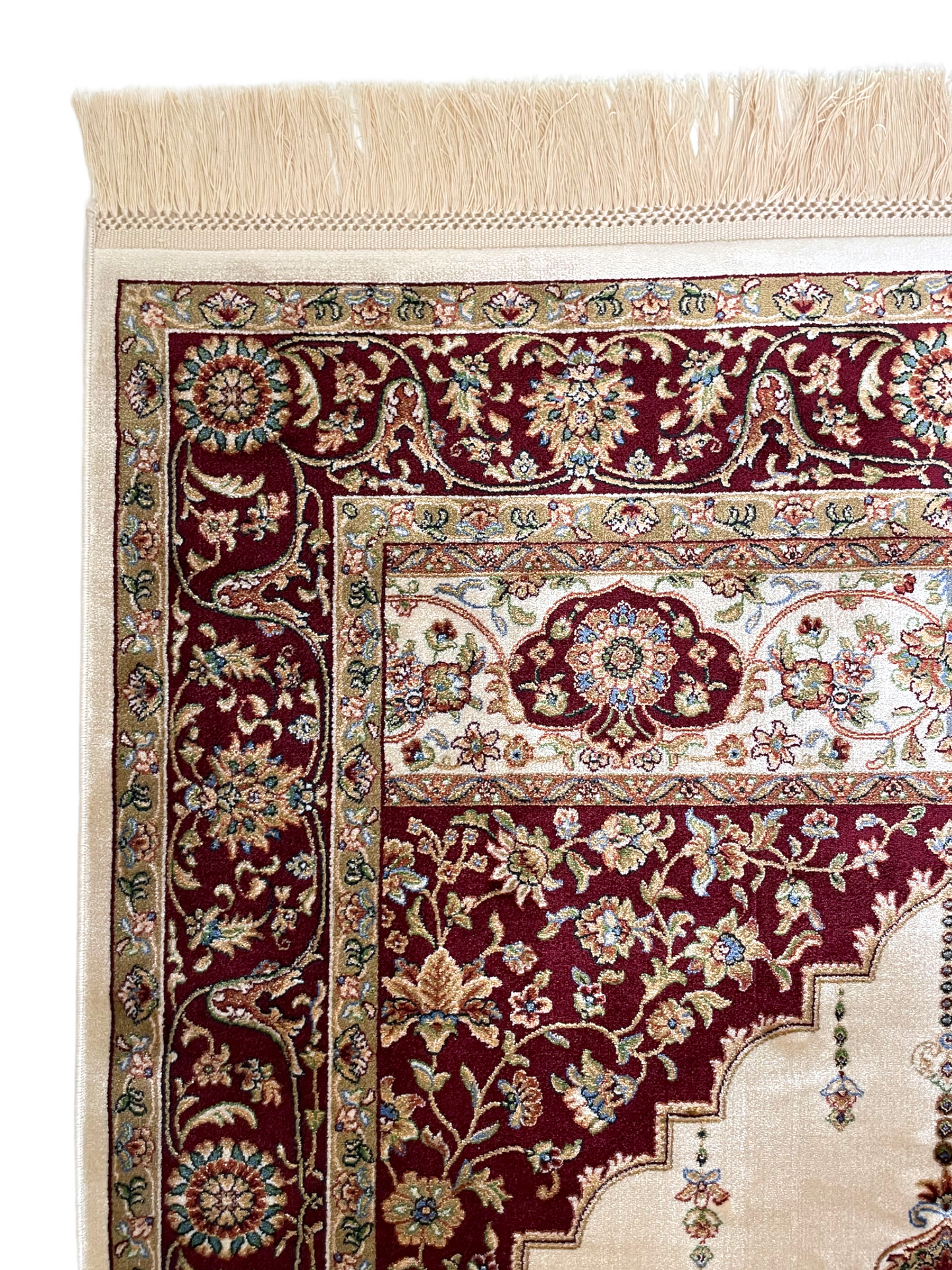 The Salik rug displays the traditional Islamic "mihrab" design with additional classic design elements. 