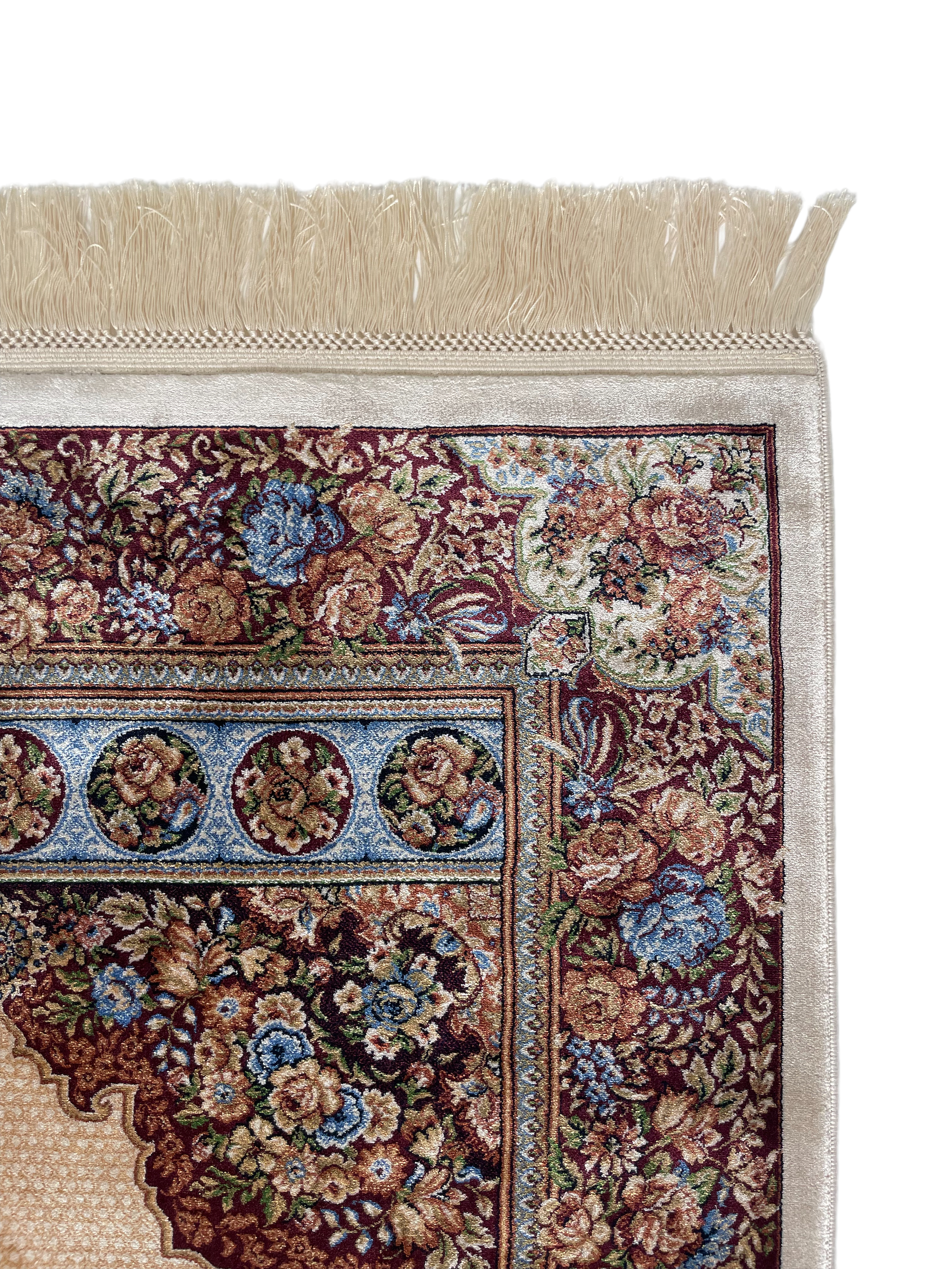 The Hudur rug displays the traditional Islamic "mihrab" design.