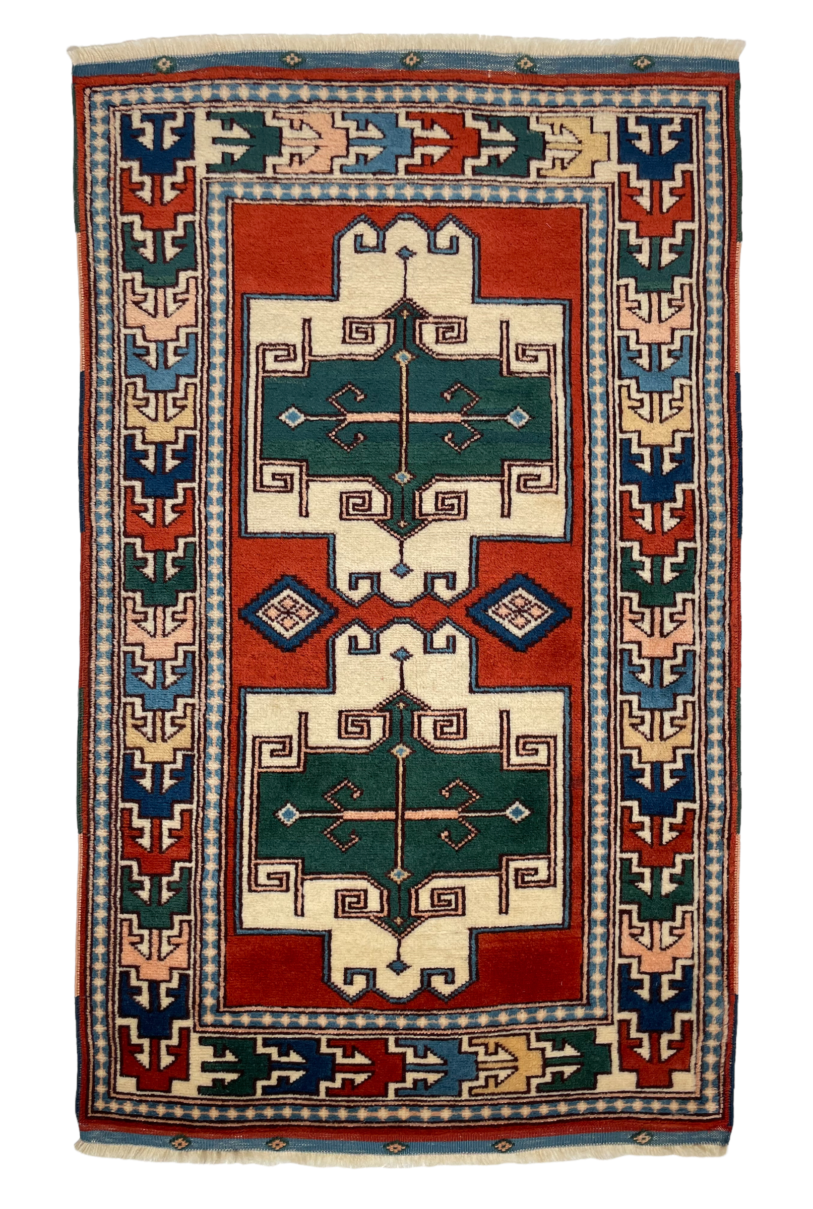 The Tajdid rug is one of our most unique finds and features a traditional Turkish design with bold, eccentric colors. 